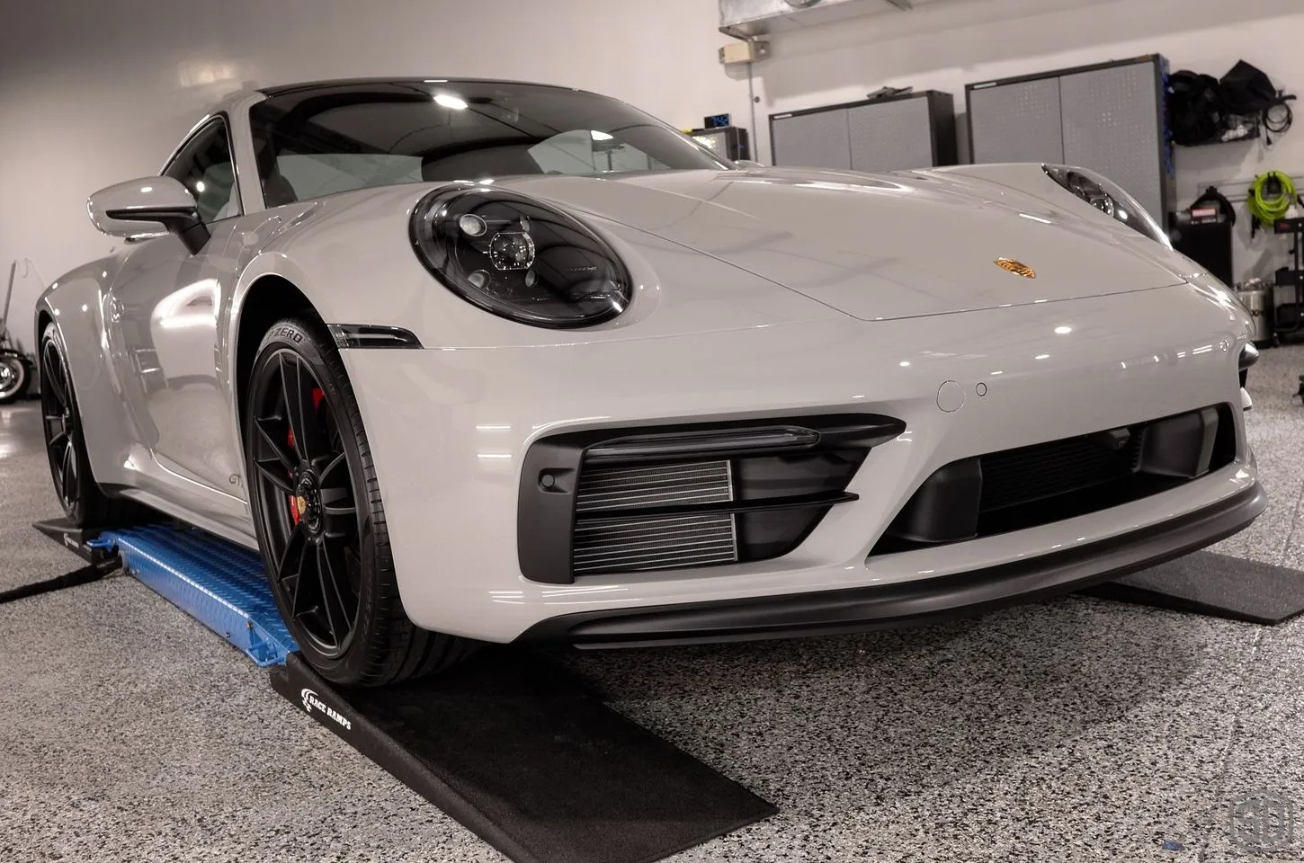 2022 Porsche 911 Carrera GTS in a professional automotive detailing bay